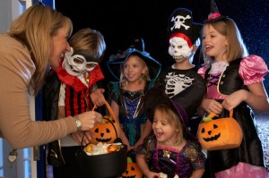 Happy Halloween party with children trick or treating